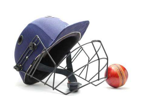 cricket helmet and ball