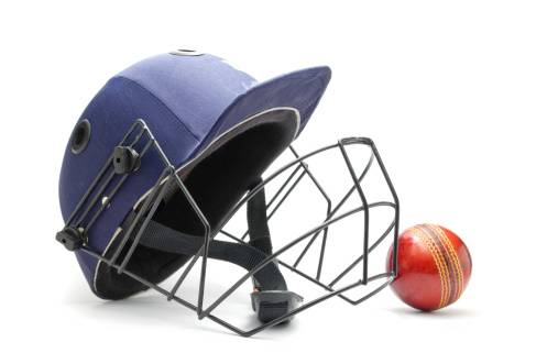 cricket helmet and ball
