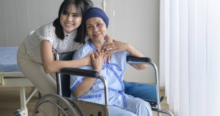 Cancer patient woman wearing head scarf