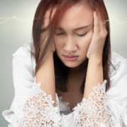 acoustic neuroma treatment - woman suffering headache
