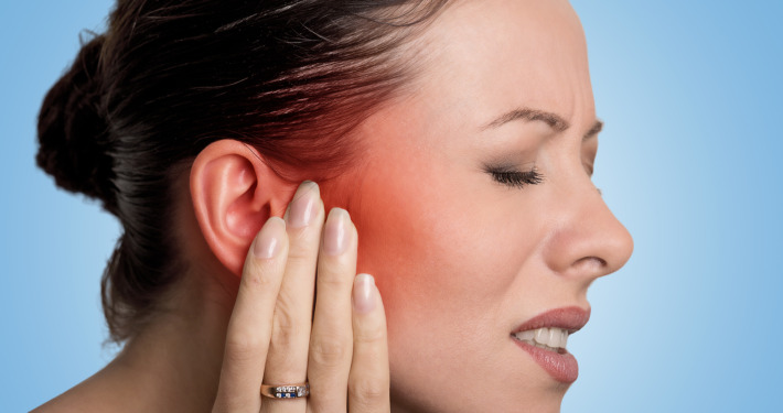treatments for trigeminal neuralgia - female having ear pain