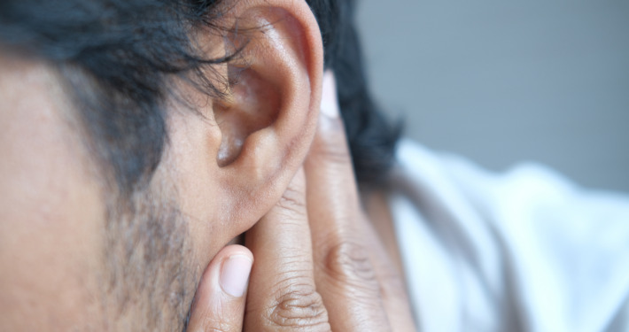 vestibular schwannoma treatment - man having ear pain