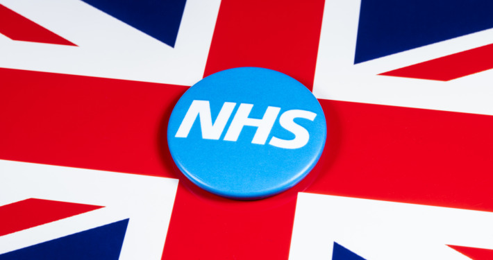 gamma knife radiosurgery - The National Health Service symbol over the UK flag